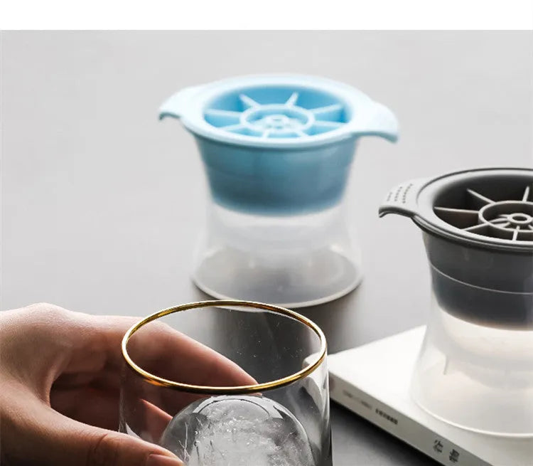 Flexible silicone ice tray for making large ice hockey shapes and spherical or pentagonal ice cubes in various colours