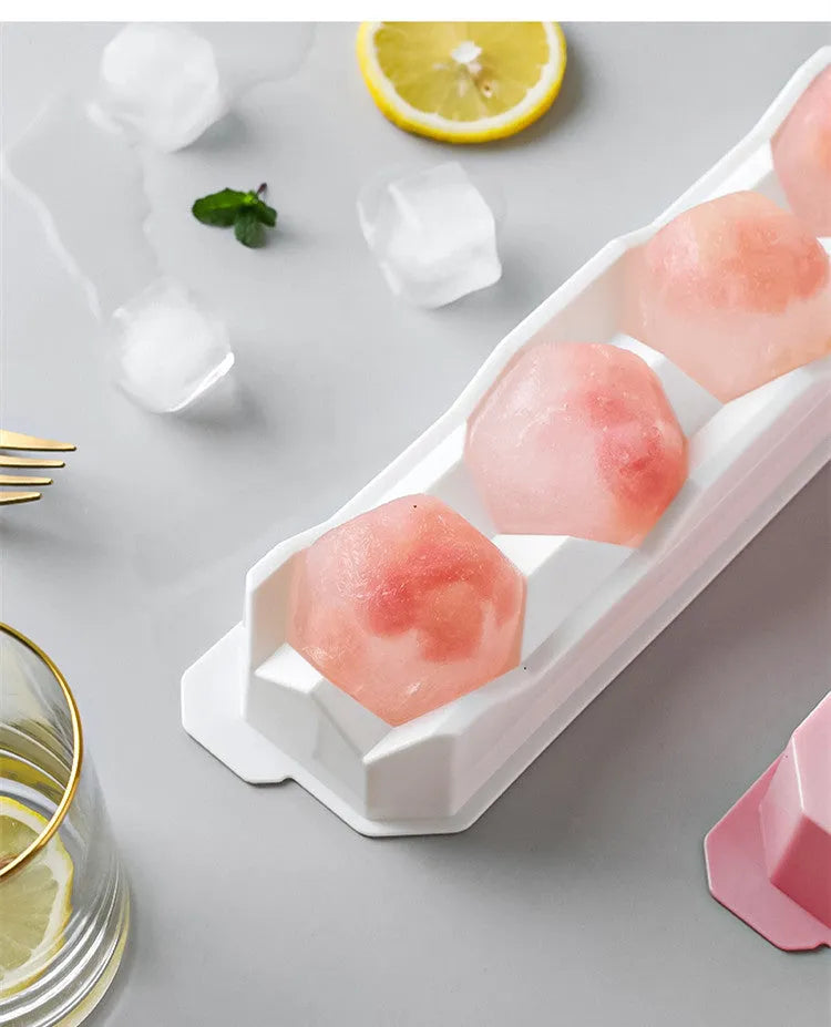 Flexible silicone ice tray for making large ice hockey shapes and spherical or pentagonal ice cubes in various colours