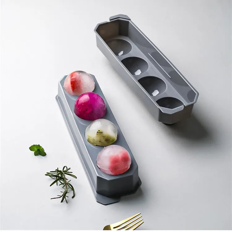 Flexible silicone ice tray for making large ice hockey shapes and spherical or pentagonal ice cubes in various colours