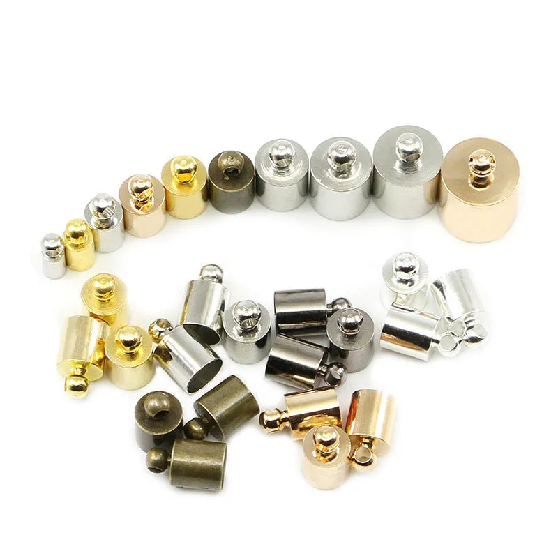 Assortment of multi-colour electroplated copper weight caps and bell caps in various sizes for crafting.