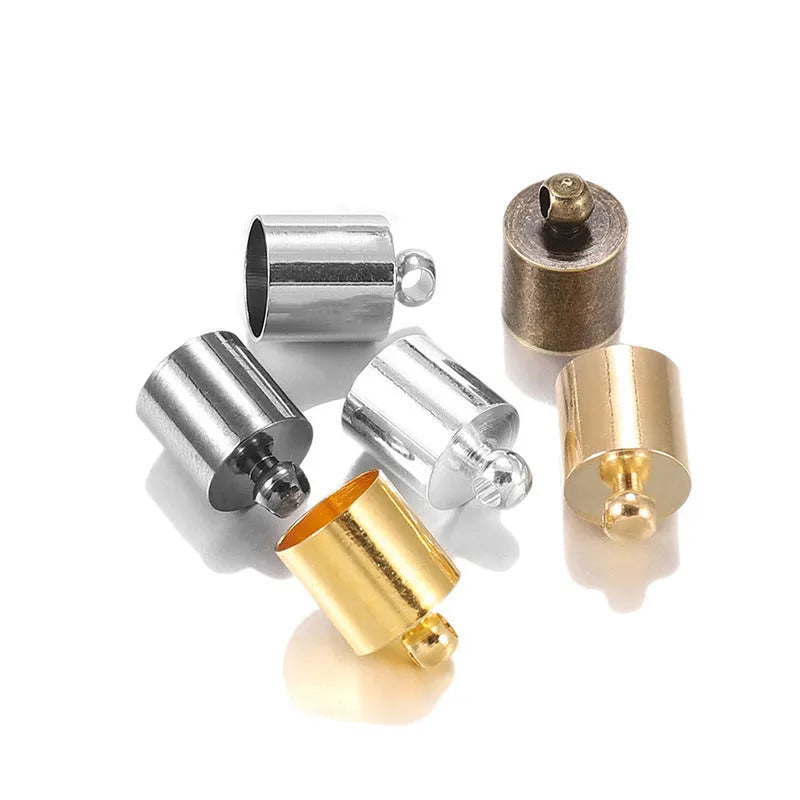 Assortment of multi-colour electroplated copper weight caps and bell caps in various sizes for crafting.