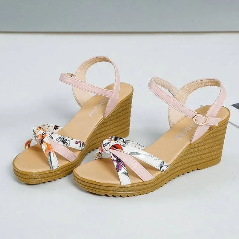 Women's pink PU wedge sandals with a fish mouth style and buckle closure on a non-slip sole.