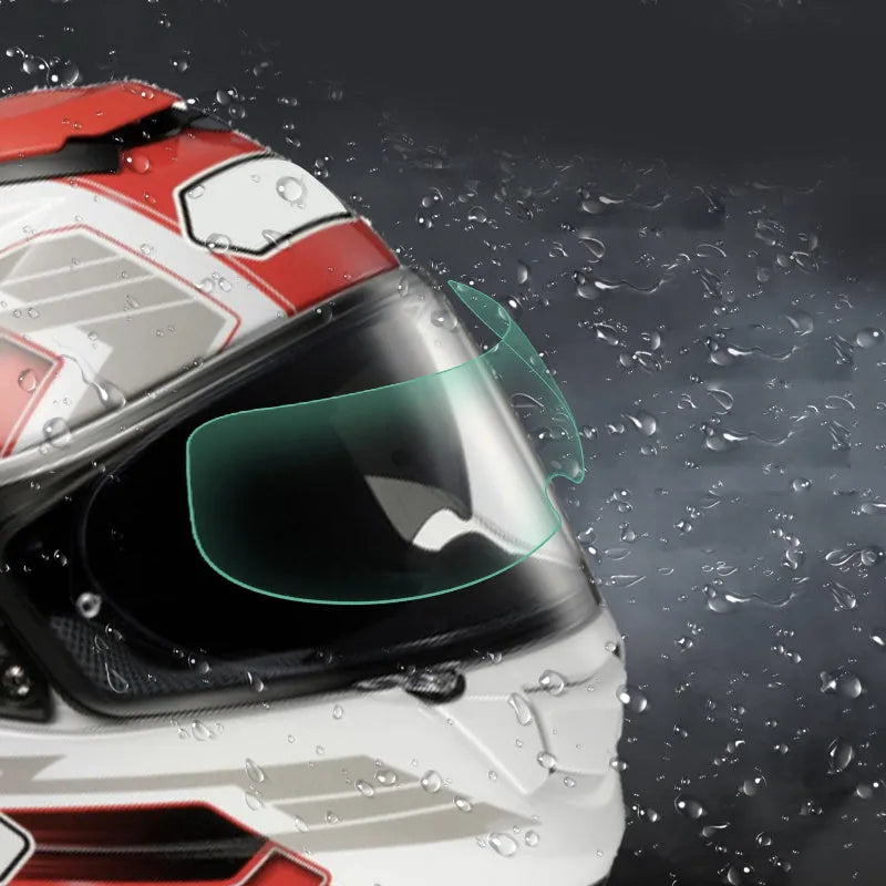 Blue motorcycle helmet waterproof rainproof anti-fog film with nano ceramic scratch resistant layer on a table.