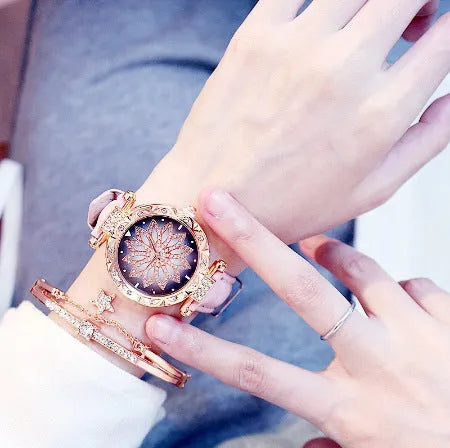 Women's full diamond bezel watch with round dial in multiple colour options showing pin buckle clasp