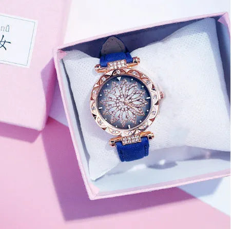 Women's full diamond bezel watch with round dial in multiple colour options showing pin buckle clasp