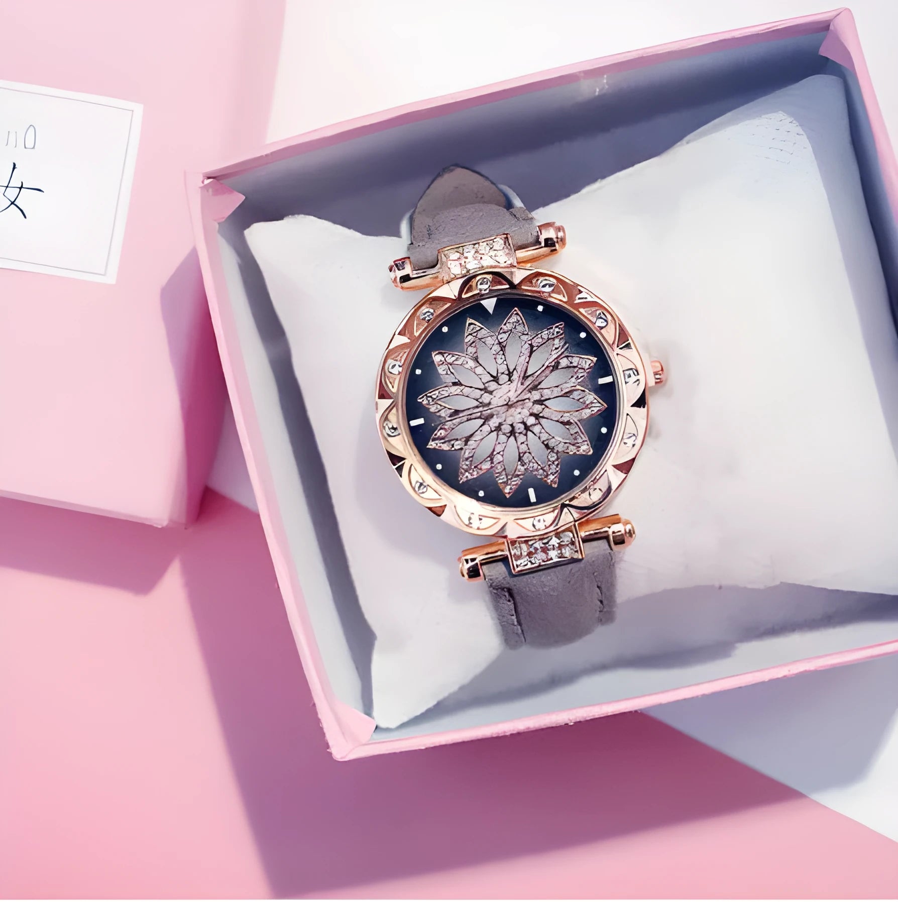 Women's full diamond bezel watch with round dial in multiple colour options showing pin buckle clasp