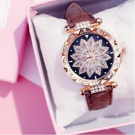 Women's full diamond bezel watch with round dial in multiple colour options showing pin buckle clasp