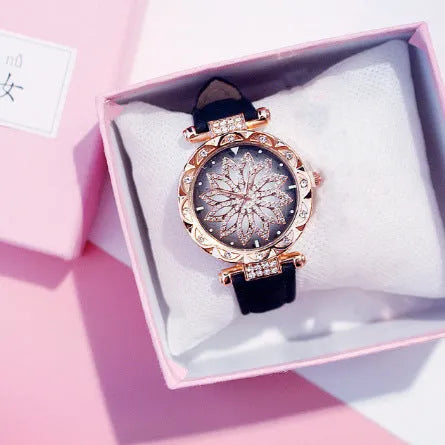 Women's full diamond bezel watch with round dial in multiple colour options showing pin buckle clasp