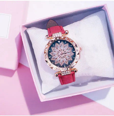 Women's full diamond bezel watch with round dial in multiple colour options showing pin buckle clasp