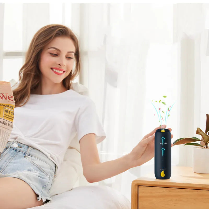 50ml rechargeable automatic aromatherapy diffuser with timer on a bathroom counter
