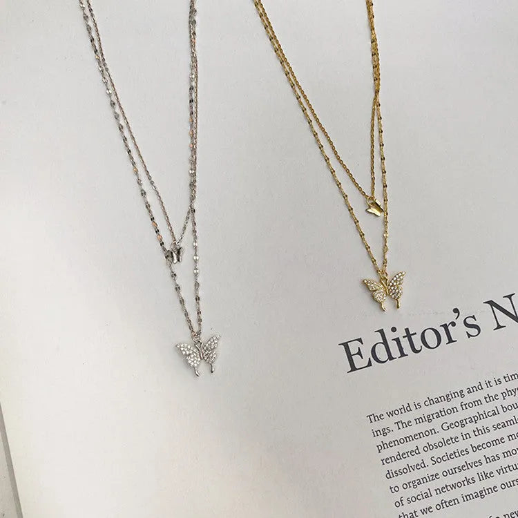 Silver colour double layer clavicle chain necklace with shiny butterfly pendant on copper base
