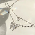 Silver colour double layer clavicle chain necklace with shiny butterfly pendant on copper base