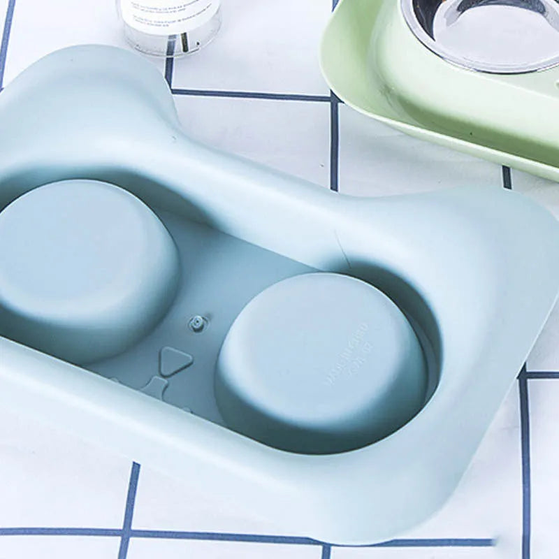 Pet stainless steel drinking water and feeding cat bowl with blue PP tray on floor