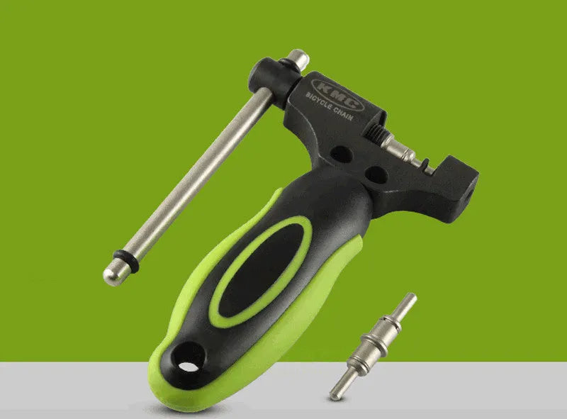 Green steel bicycle chain repair tool with a double shaft device and a separate chain driver.