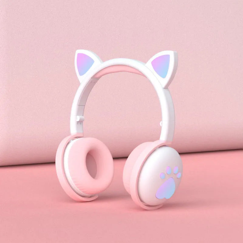 Luminous Cool Cat Ear Bluetooth Headset with rainbow LED light effect on pink background