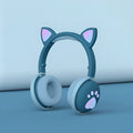 Luminous Cool Cat Ear Bluetooth Headset with rainbow LED light effect on pink background