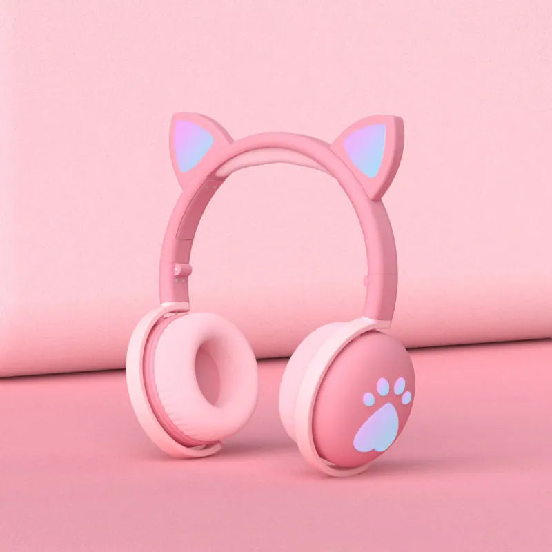 Luminous Cool Cat Ear Bluetooth Headset with rainbow LED light effect on pink background