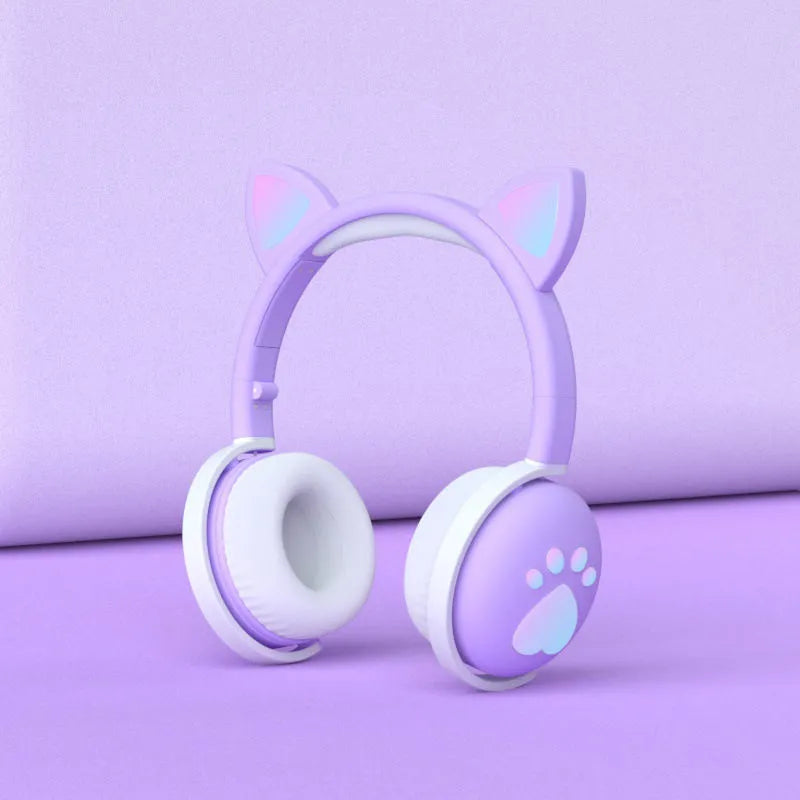 Luminous Cool Cat Ear Bluetooth Headset with rainbow LED light effect on pink background