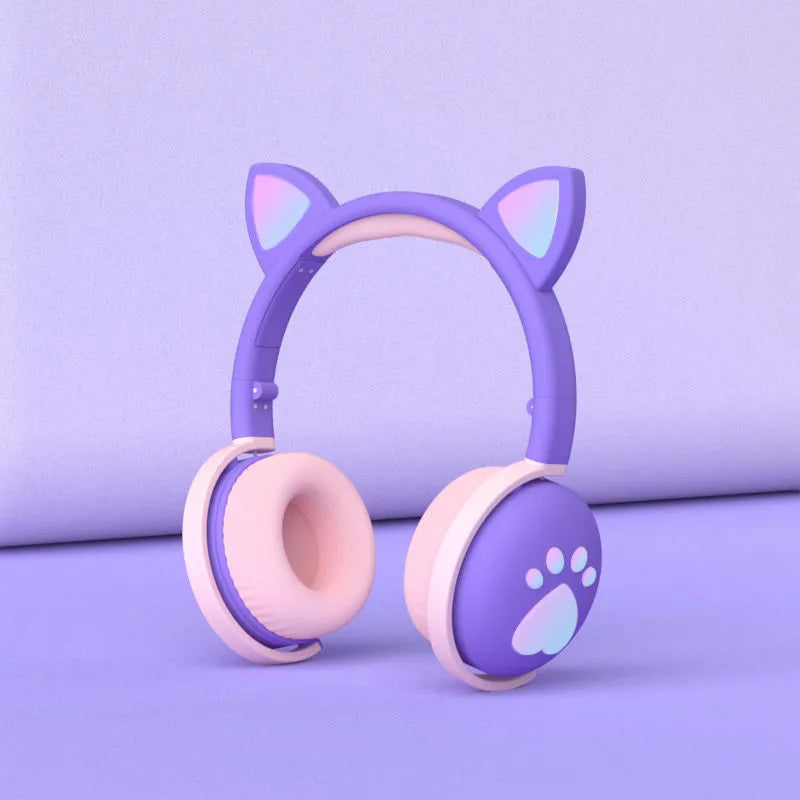 Luminous Cool Cat Ear Bluetooth Headset with rainbow LED light effect on pink background