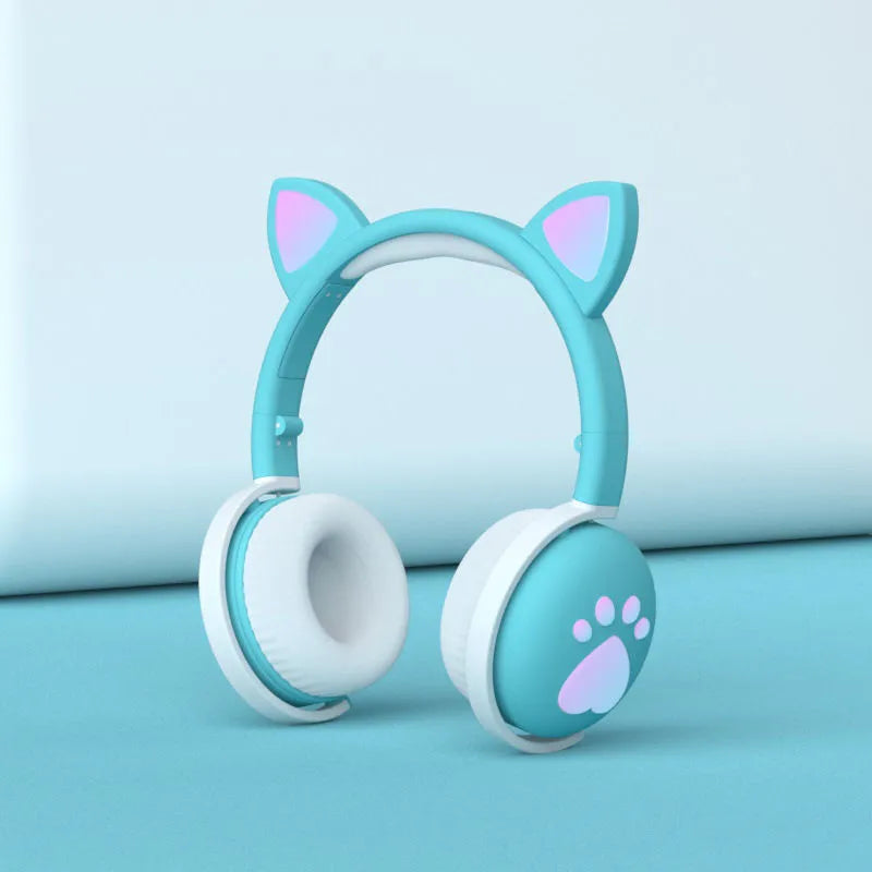 Luminous Cool Cat Ear Bluetooth Headset with rainbow LED light effect on pink background