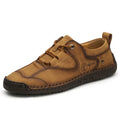 Men's black microfiber leather casual shoes with round toe on a plain background