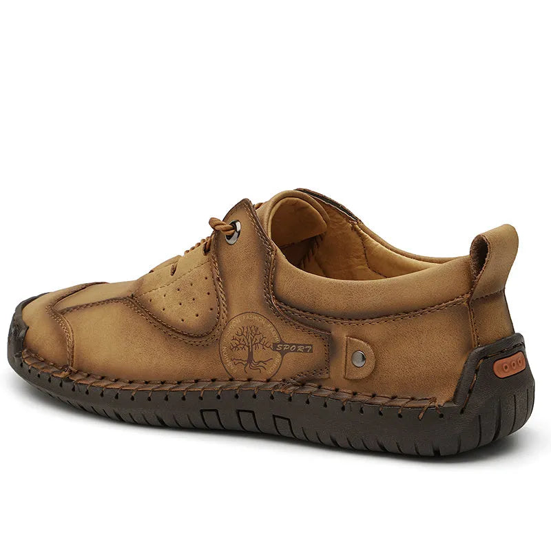 Men's black microfiber leather casual shoes with round toe on a plain background