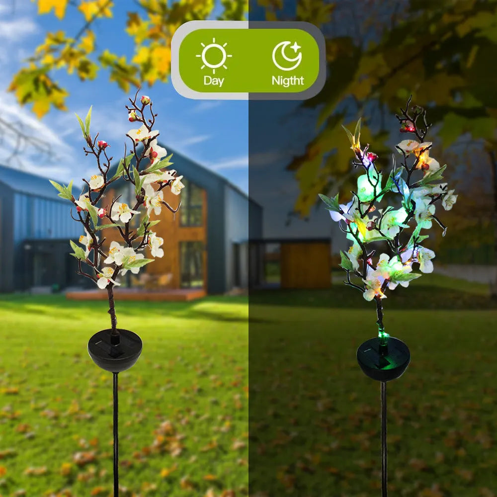 Solar-powered cherry blossom firework string lights with ground spike for outdoor garden decoration