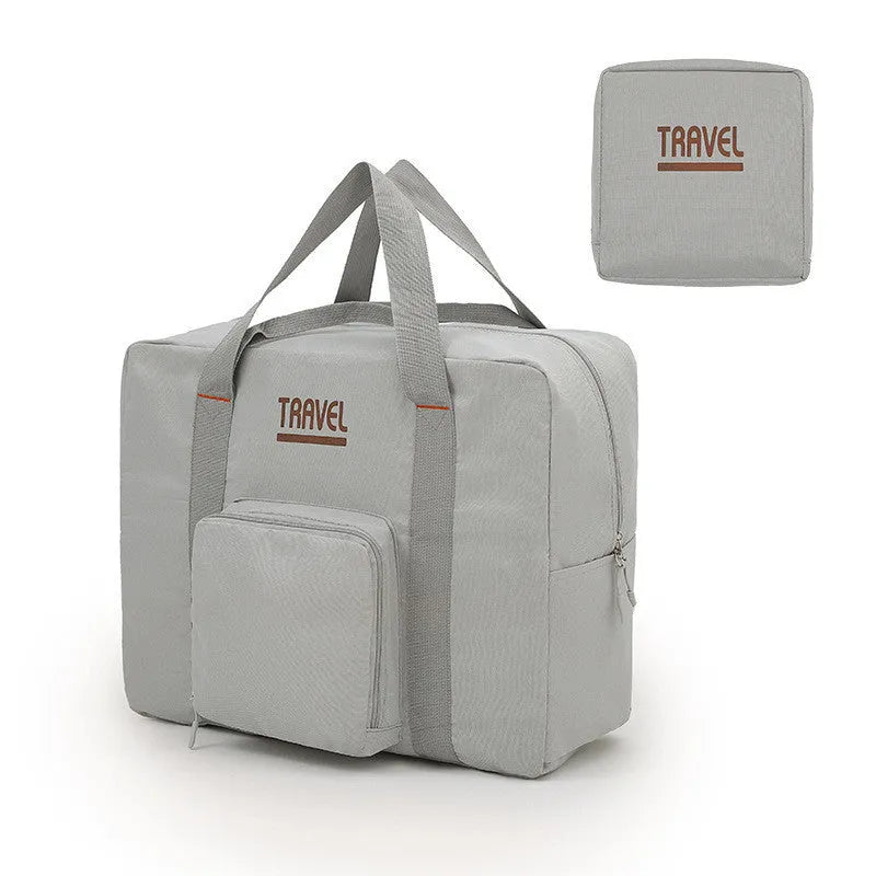 Cube-shaped travel storage bag in Oxford cloth, shown in black, grey, khaki, and pink colour options.