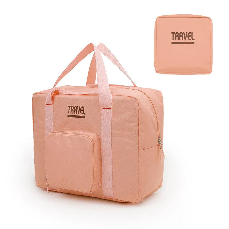 Cube-shaped travel storage bag in Oxford cloth, shown in black, grey, khaki, and pink colour options.