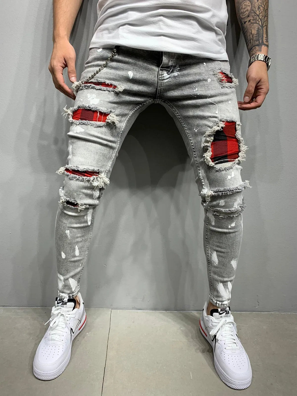Men's cotton paint jeans in black, straight-leg style for casual or artistic use