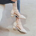 Women's apricot suede D'Orsay flats with an ankle strap and a low 3cm heel.
