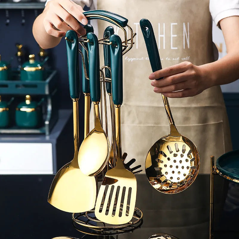 7 PCS stainless steel silicone kitchen utensil set with slotted spatula, turner, ladle, serving spoon, pasta server on a countertop
