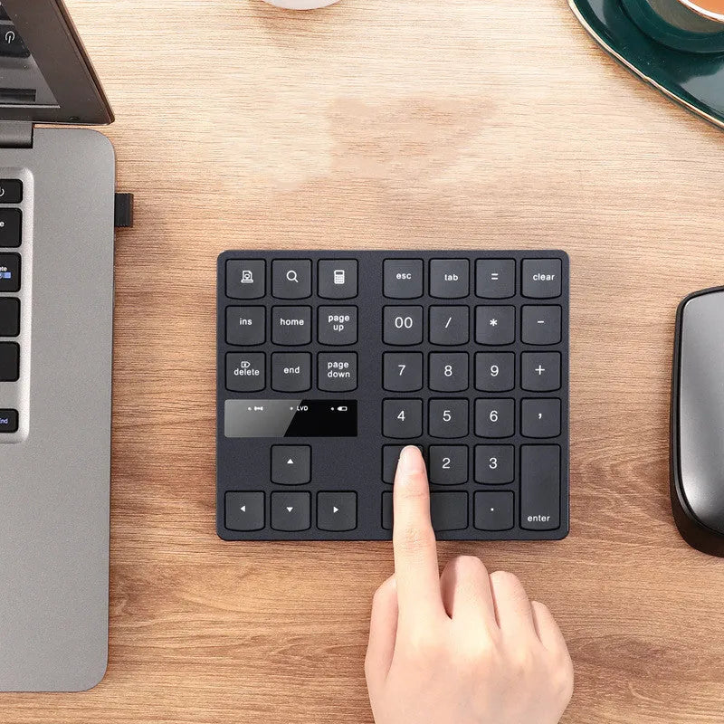 Black wireless 35-key numeric keyboard with compact ABS body and USB receiver