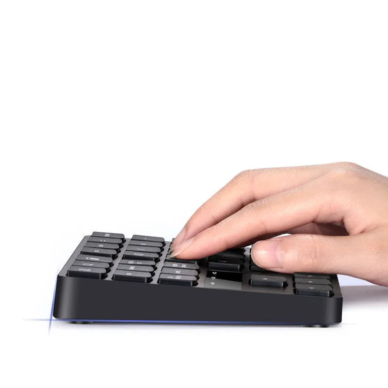 Black wireless 35-key numeric keyboard with compact ABS body and USB receiver