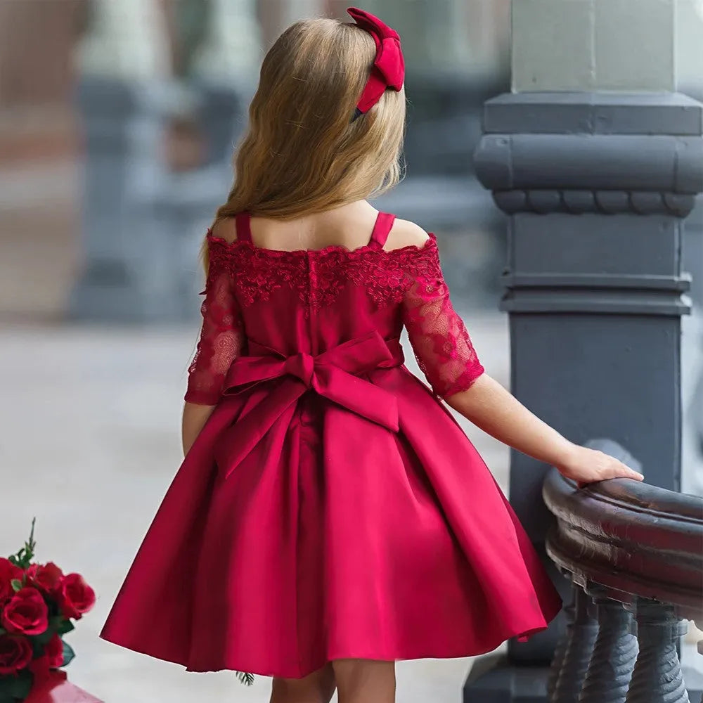 Girls lace-trimmed polyester dress and matching skirt set in dark red, shown in child size.