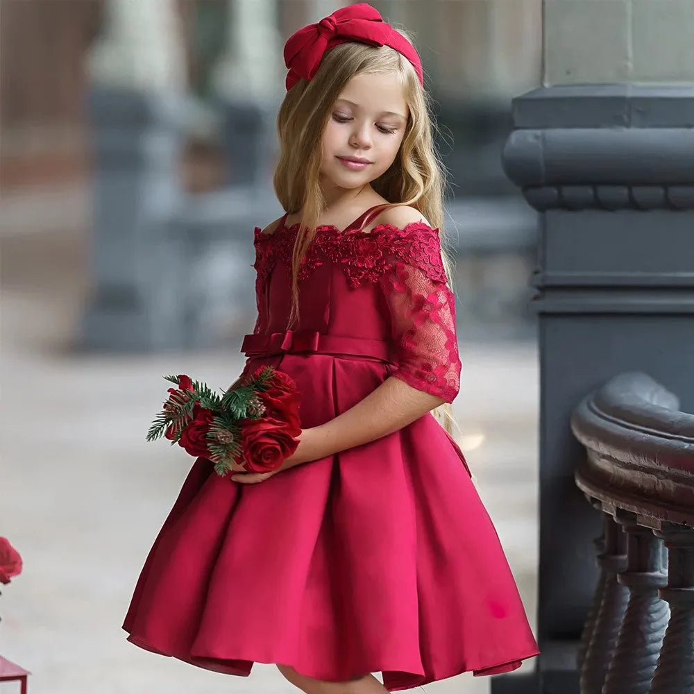 Girls lace-trimmed polyester dress and matching skirt set in dark red, shown in child size.
