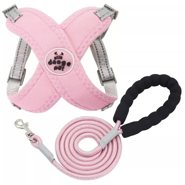 Polyester dog vest and matching hand holding rope leash set in blue, green, pink, or yellow.