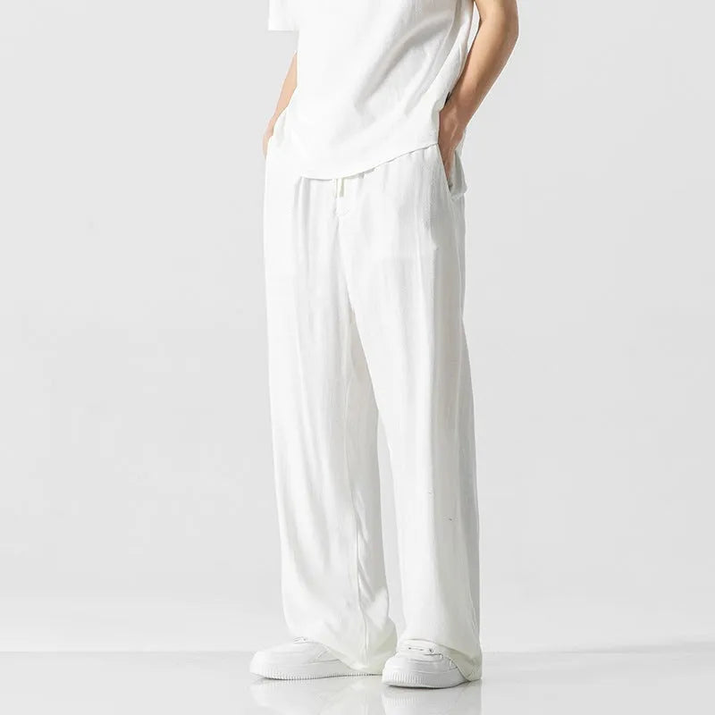 Men's bamboo fibre linen trousers in loose straight-leg cut with cropped length and drawstring waist