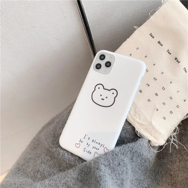 Soft silicone mobile phone case for iPhone with a cartoon Korean bear design on the back.