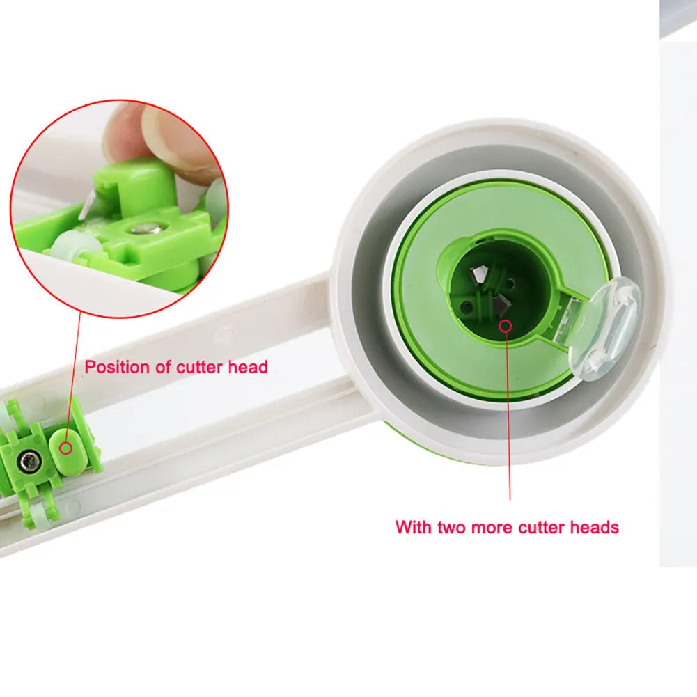 Plastic round paper cutter in orange colour on green background with A3 cutting capacity