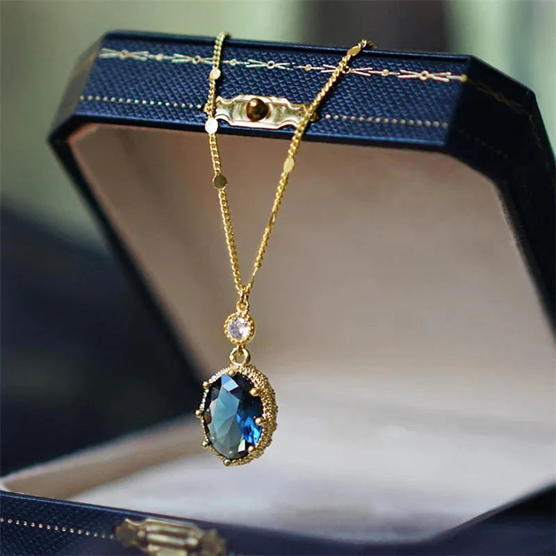 Gold geometric pendant necklace with French retro styling on copper chain