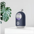 White and blue portable mosquito killer lamp with UV light, fan, and carry handle