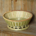 Handmade natural bamboo storage basket shown in three size variants for home organisation.
