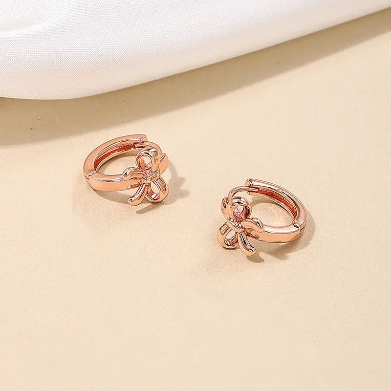 Copper earrings for women with bow and cherry shapes in gold, silver, and rose gold electroplated finishes