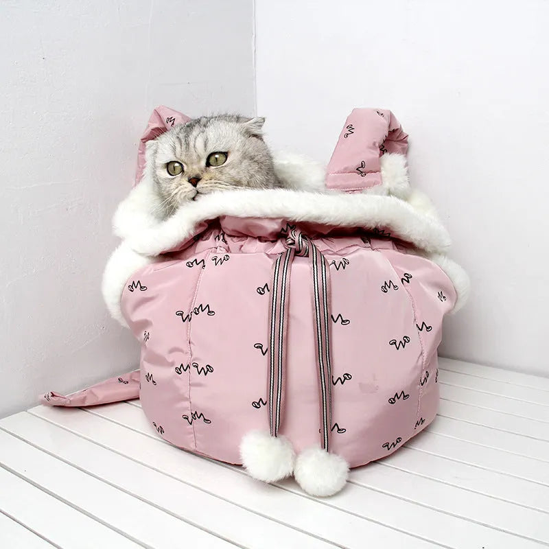 Blue winter pet carrier backpack made of plush flannel for outdoor travel with small cats and dogs