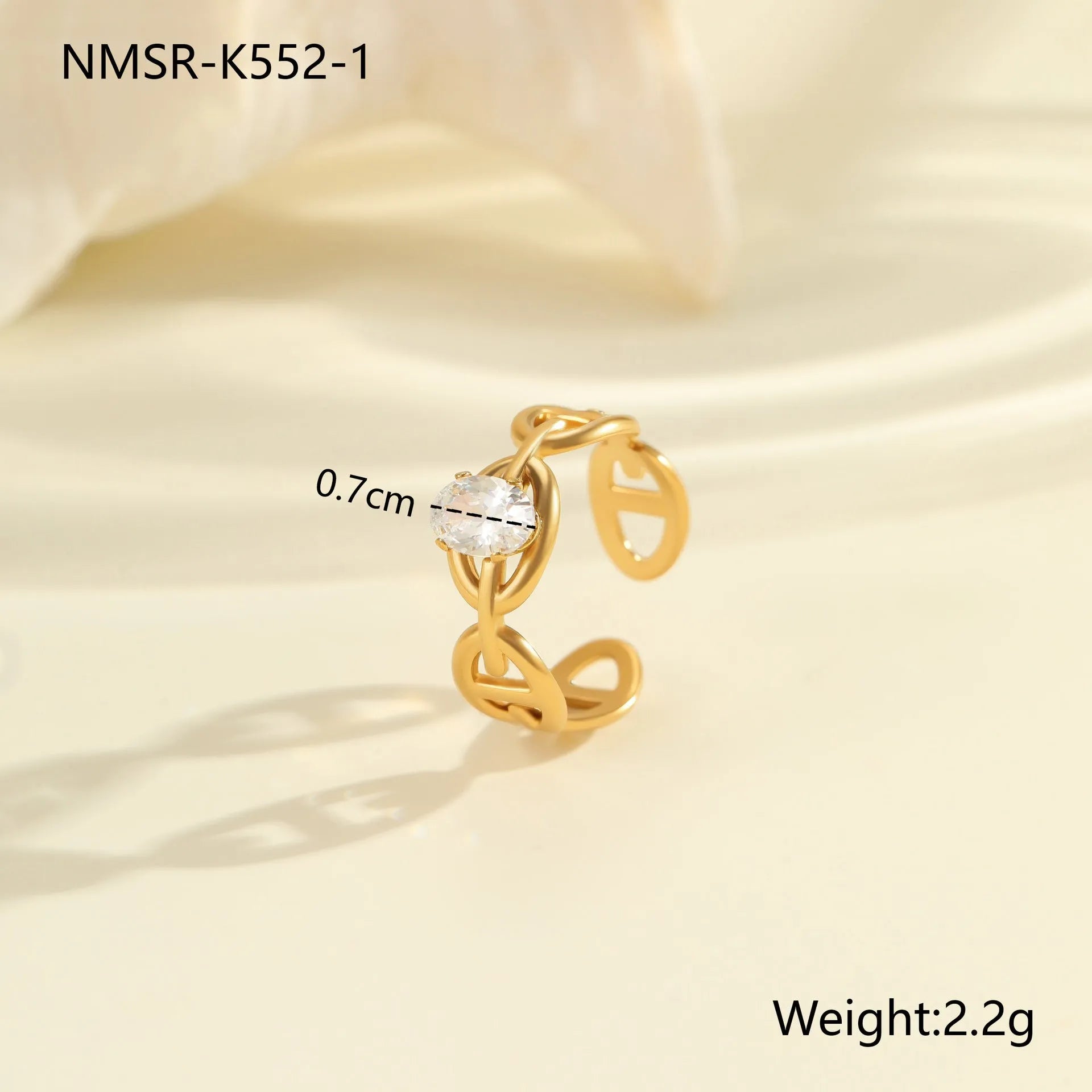 Geometric stainless steel zircon ring with open-mouth adjustable design on a hand.
