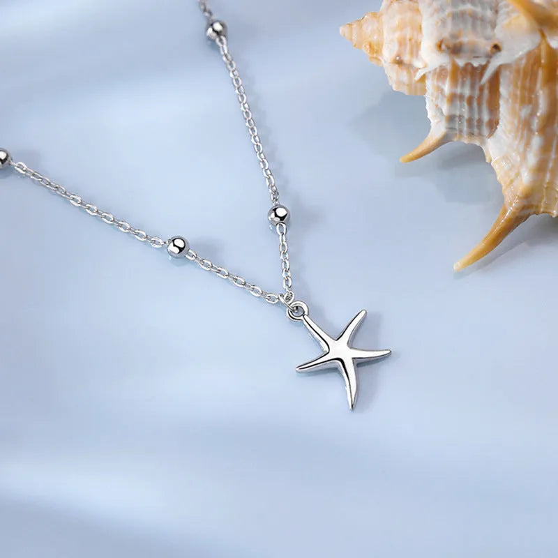Women's sterling silver anklet with starfish charm and round beads chain
