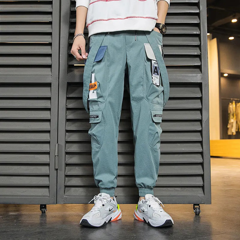 Men's Hong Kong fashion workwear casual pants with multi-pockets, loose fit, zip fly, in Black colour, T400 fabric