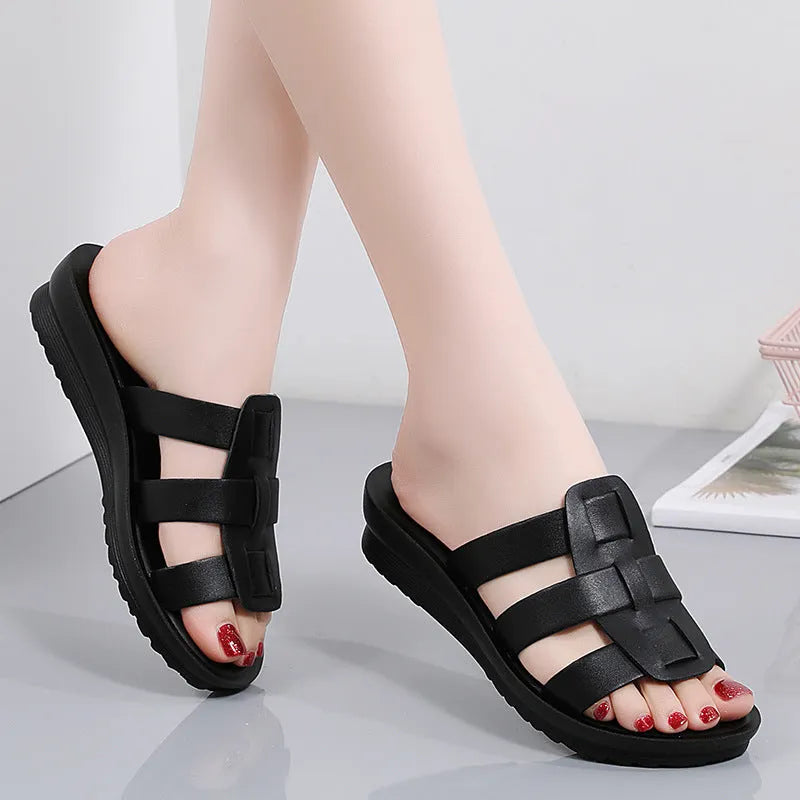 Women's large size soft sole slippers in beige, black and brown colours with flat bottom design