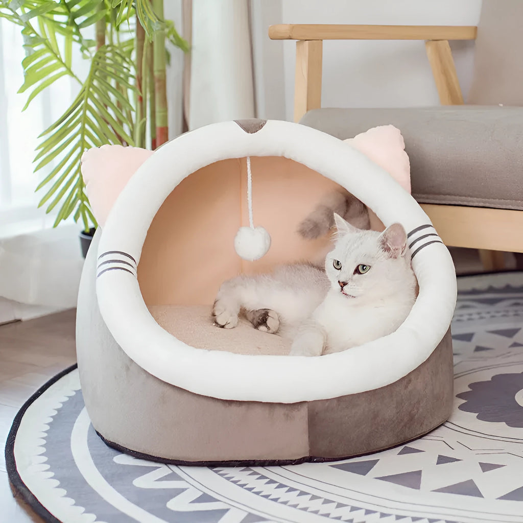 Enclosed cat litter kennel with plus velvet lining in camel colour, side view with mat included